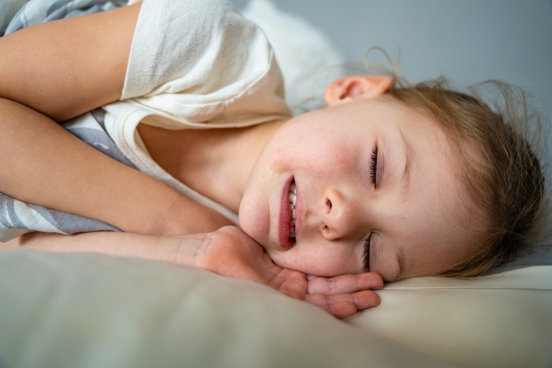 Why Does My Child Grind Their Teeth at Night? Teeth Grinding, Sleep Apnea & Jaw Development